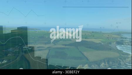 Displaying aerial coastal farmland with translucent data overlay over cliffs, showing upward arrow Stock Photo