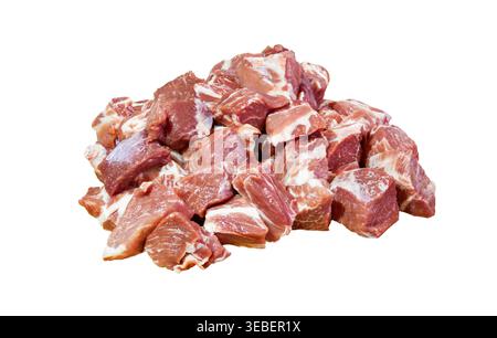 Raw pork, cut into small cubes isolated on white background. Fresh pork meat with lard . Selective focus Stock Photo