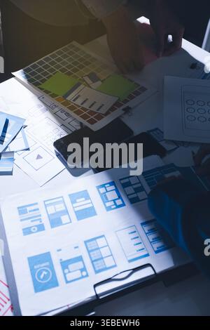 Team of Program Developer Collaborating on UXUI Design Planning in a Modern Office Environment Stock Photo