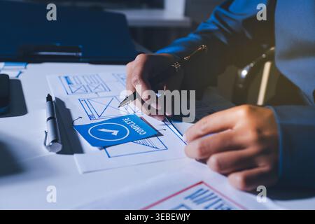 Team of Program Developer Collaborating on UXUI Design Planning in a Modern Office Environment Stock Photo