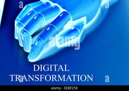 Close-up of a robotic hand with the text "Digital Transformation", representing the shift toward modern technology, automation, and data-driven system Stock Photo