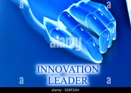 Close-up of a robotic hand with the text "Innovation Leader", representing leadership in technology, digital transformation, and forward-thinking stra Stock Photo