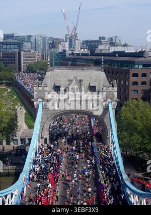 Runners crossing Tower Bridge during the 2026 TCS London Marathon ...