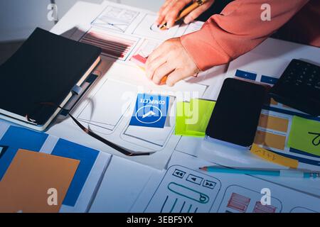 team of UI UX web designer are working together to develop mobile responsive websites with UI UX front end designer previews Stock Photo