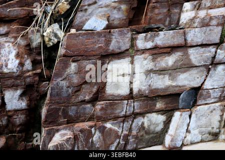 Layered rock texture. Mountain stone pattern background. Stock Photo
