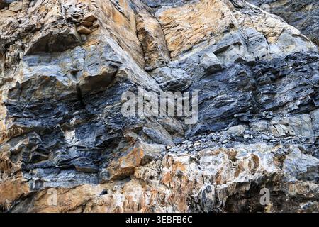 Laminate rock texture. Mountain pattern background. Stock Photo