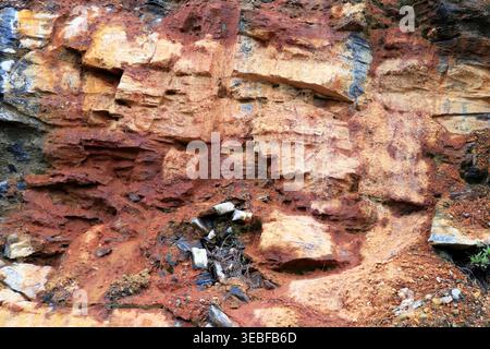 Rustic layered rock texture. Mountain pattern background. Stock Photo