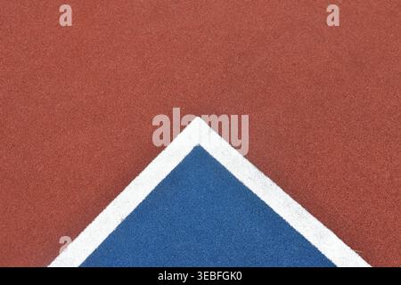 white line on blue with brown football artificial turf texture and background Stock Photo