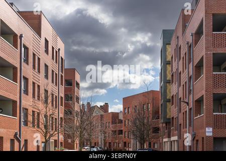 Urban residential complex with modern brick architecture. London, UK, 24 March 2024 Stock Photo