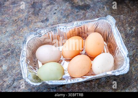 Eggs heirloom chicken egg macro closeup homemade colorful traditional Greek food on Ikaria island, Greece longevity blue zone Stock Photo