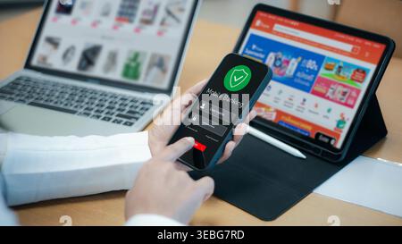 E-commerce shopping and mobile banking payment at workspace,Fintech concept with smartphone login and digital payment security,Woman hands using mobil Stock Photo