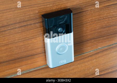 Ring doorbell on front door, UK. Smart home security device with motion activated camera hat allow users to see & hear visitors via a smartphone app Stock Photo