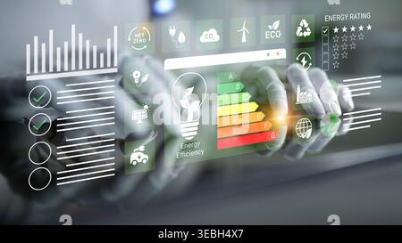 This image showcases a digital dashboard focused on energy efficiency with hands interacting with graphs and eco-friendly icons, emphasizing modern Stock Photo
