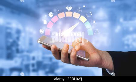 Hand Holding Smartphone Displaying Visual Indicator of Risk Level with Infographic Elements in a Modern Business Environment Quark. Stock Photo