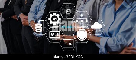 Group of professionals collaborating on technology solutions with digital interface showcasing AI, APIs, data management, and no-code development Stock Photo