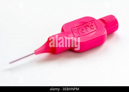 London. UK- April 22. 2026. Macro close up of a Te Pe interdental brush isolated on white. Stock Photo