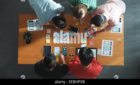 Top view of smart software developer working together to plan Ux Ui design. Group of startup people planning and design wireframe prototype design or Stock Photo