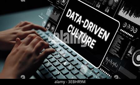 Hands Typing on Keyboard with Data-Driven Culture Text and Abstract Graphical Elements in the Background. Asymptotic smart data analytic. Stock Photo