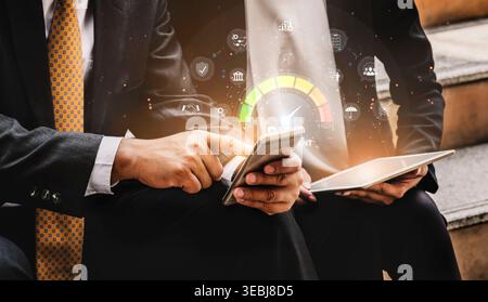 Business Professionals Analyzing Data on Mobile Device with Graphical Data Visualization Elements in Modern Office Setting Sigmoid Stock Photo