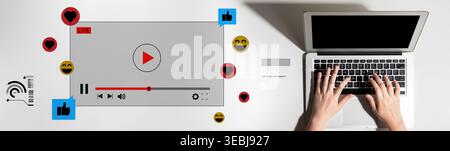 A modern laptop setup featuring live streaming elements, social media reactions, and a clean workspace, ideal for content creators seeking engagement Stock Photo