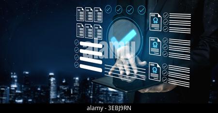 A professional interacts with a holographic interface displaying documents and checkmarks, illustrating the concept of digital document verification Stock Photo