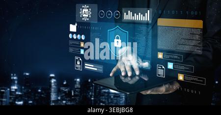 A close-up view of hands using a tablet featuring a digital security interface with data protection symbols and analytics in a nighttime city Stock Photo