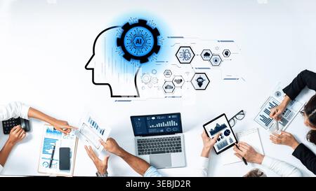 A business team collaborates in a workspace, utilizing technology and artificial intelligence concepts to drive innovation and strategy development Stock Photo