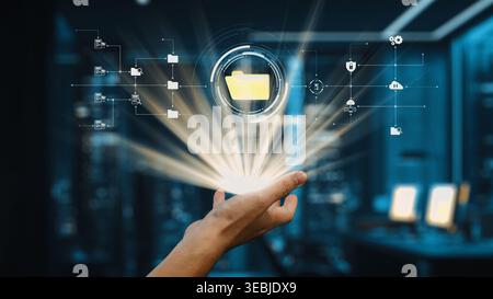 A hand reaches out towards a glowing digital folder, symbolizing modern data management and technology innovation in a futuristic office environment Stock Photo