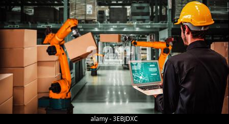 Smart robot arm systems for innovative warehouse and factory digital technology . Automation manufacturing robot controlled by industry engineering Stock Photo