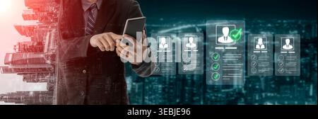 Businessman Using Digital Technology to Manage Online Profiles and Data Visualization in Urban Landscape at Night Sigmoid Stock Photo