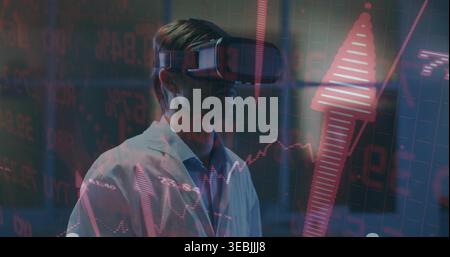 Analyzing scientist wearing white lab coat and VR headset studying hologram market charts in lab Stock Photo