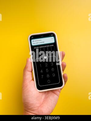 Smartphone displaying OTP verification code for two factor authentication. Mobile security, digital identity protection, secure login process, user au Stock Photo