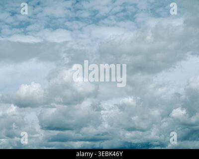 High-resolution image of a moody overcast sky filled with dense, textured clouds. Perfect for weather concepts, atmospheric backgrounds, climate theme Stock Photo