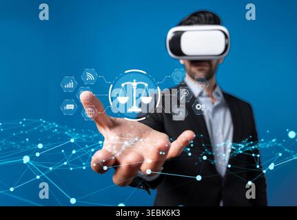 A professional in a suit interacts with virtual elements representing law and ethics of artificial intelligence, highlighting the emerging discussions Stock Photo