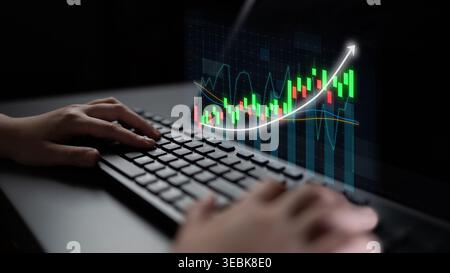 A dynamic scene featuring hands on a keyboard, analyzing stock market data through colorful graphs and charts, symbolizing investment strategies and Stock Photo