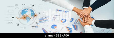 A diverse group of business professionals engaged in collaborative efforts, analyzing market trends and data insights while symbolizing teamwork and Stock Photo