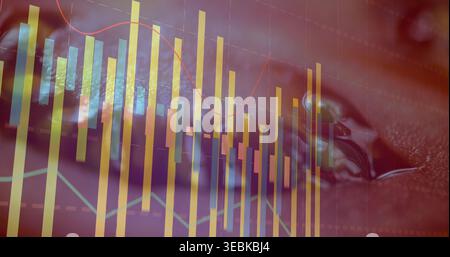 Displaying market chart overlay on macro surface, with yellow teal candles, red trend line, bead Stock Photo