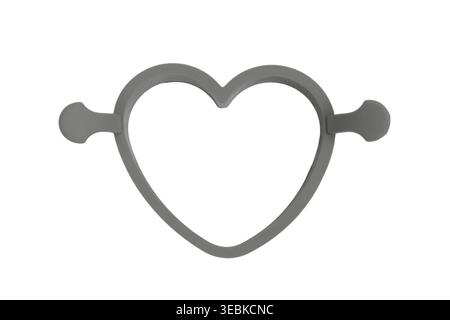 Heart shaped silicone mold for egg or pancake frying. Kitchen tool for cooking food in love shape. Culinary utensil for breakfast preparation. Isolate Stock Photo