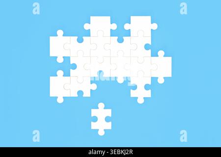 Jigsaw puzzle with missing piece on blue background. Opportunities for business problem solving, communication, partnership, teamwork concept. Stock Photo