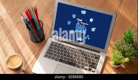 Cost reduction, cost saving concept shown on computer screen brisk, corporate business efficiently save cost and company resources by reduction of Stock Photo