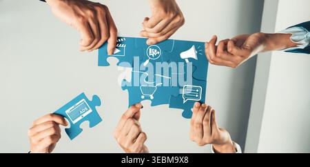 A dynamic image showcasing collaboration, with multiple hands assembling puzzle pieces that represent various business concepts like growth and Stock Photo