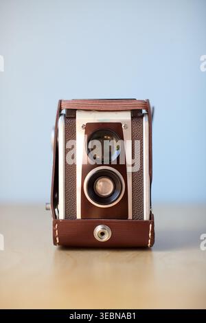 Vintage Camera Brown on blue background Stock Photo