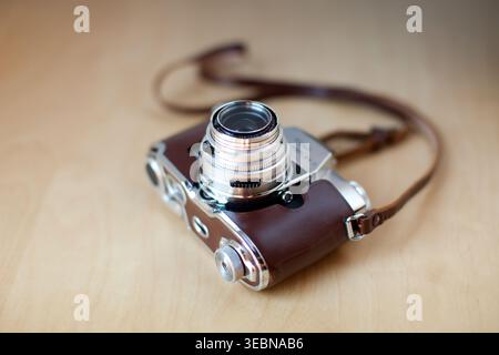 Vintage Camera Brown leather, silver with strap Stock Photo