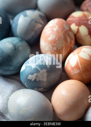 Blue and Orange Dyed Easter Eggs with Floral Imprints Stock Photo