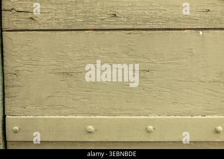 Weathered Green Painted Wooden Wall Planks With Rustic Texture And Metal Rivets Background Stock Photo