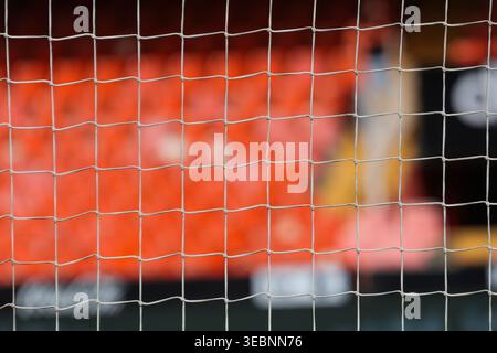 Close-up of football goal net in stadium, soccer background with mesh detail and copy space Stock Photo