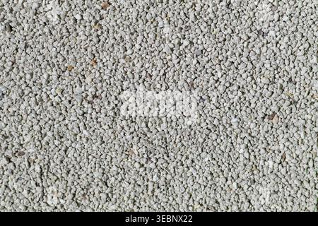 Close-up of white gravel texture with small irregular stones Stock Photo