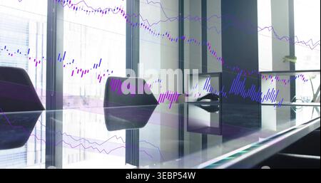 Showing glass table reflecting black swivel chairs in corporate conference room, with market graphs Stock Photo