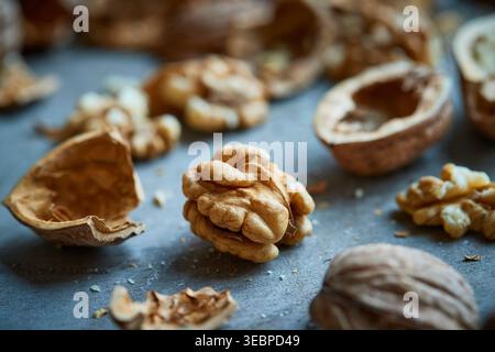 Walnut (Juglans regia). Freshly cracked walnuts Stock Photo