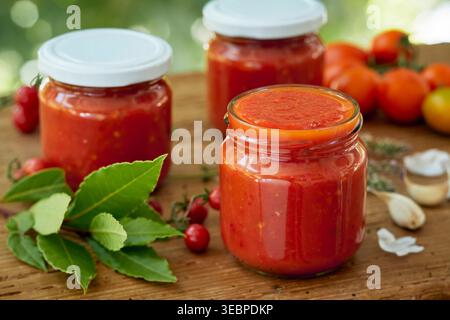 Tomato (Lycopersicon lycopersicon). Preparation of sauce in a kitchen. Germany Stock Photo